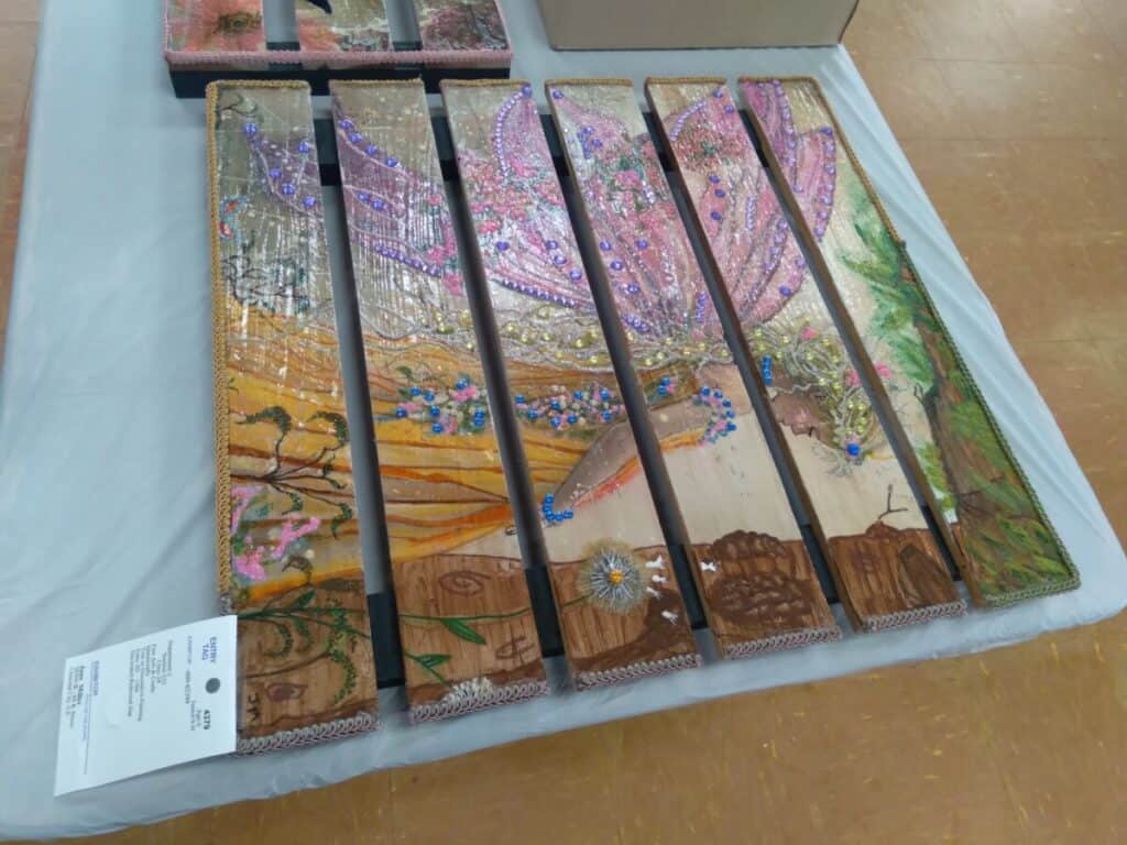 A picture of an artsy cake cut into 6 equal pieces. Some wonder how to structure a 5 day email challenge.