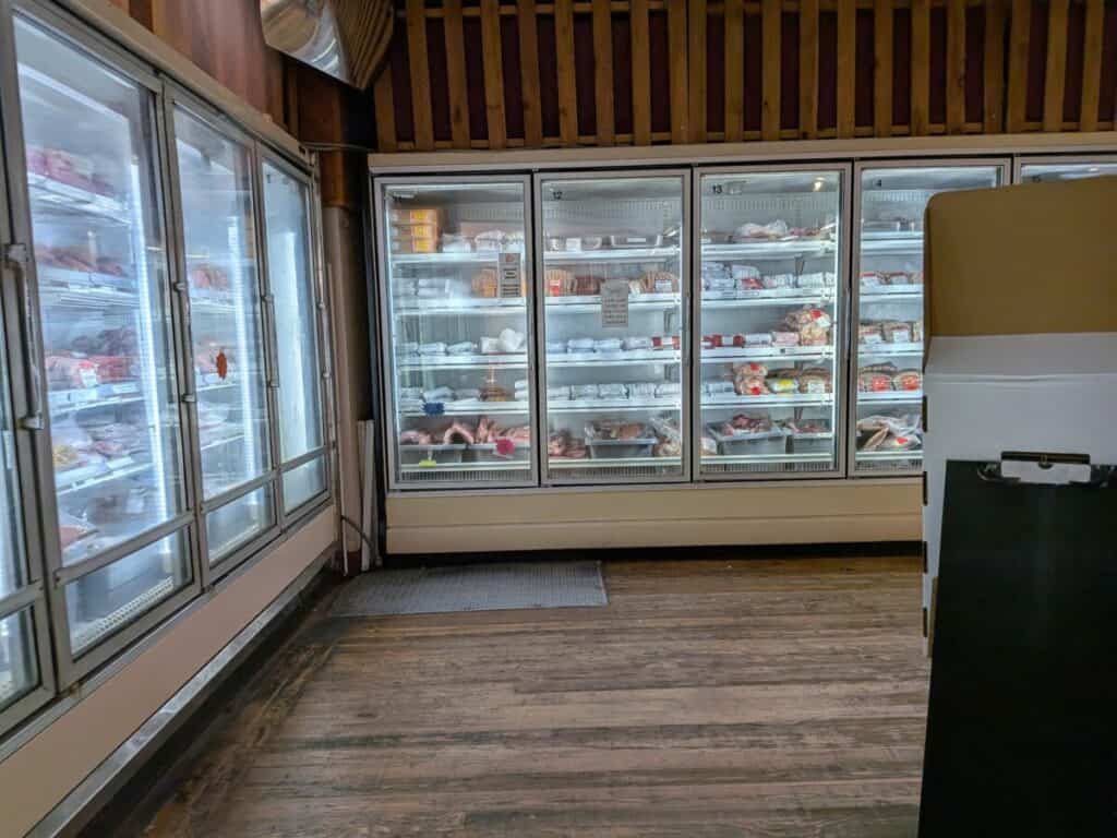A grocery store, frozen food section. Some wonder Rakuten vs. Ibotta: Which is better for groceries? 