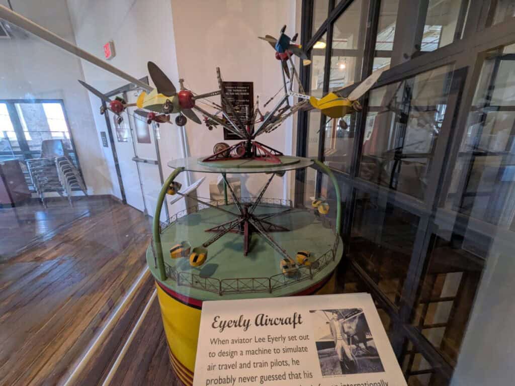 A picture of a tiny carasoul with planes and the history how a device used to train pilots turned into a carasoul. Some wonder how Systeme io trigger email sequence after opt in.
